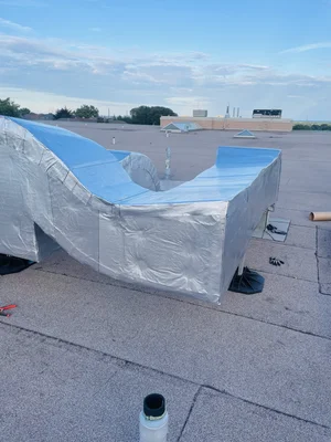 Rooftop ductwork insulation with Venture Clad finish